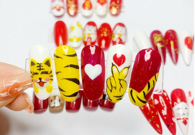 彩繪招財貓美甲，南寧美甲學(xué)?？钍酵扑]